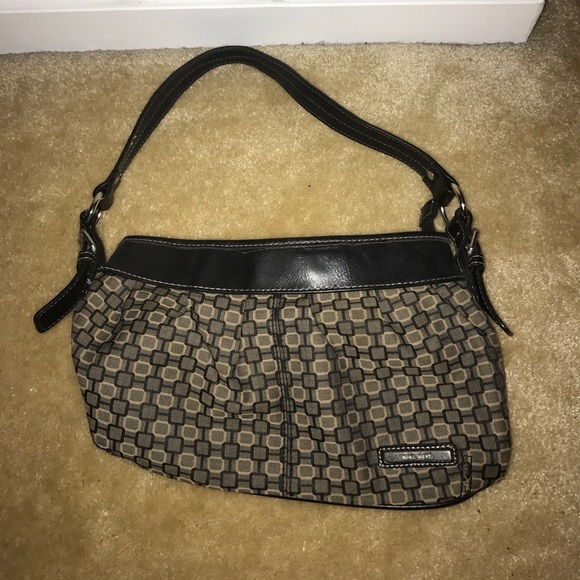Women Nine West purse and matching work bag/laptop bag.