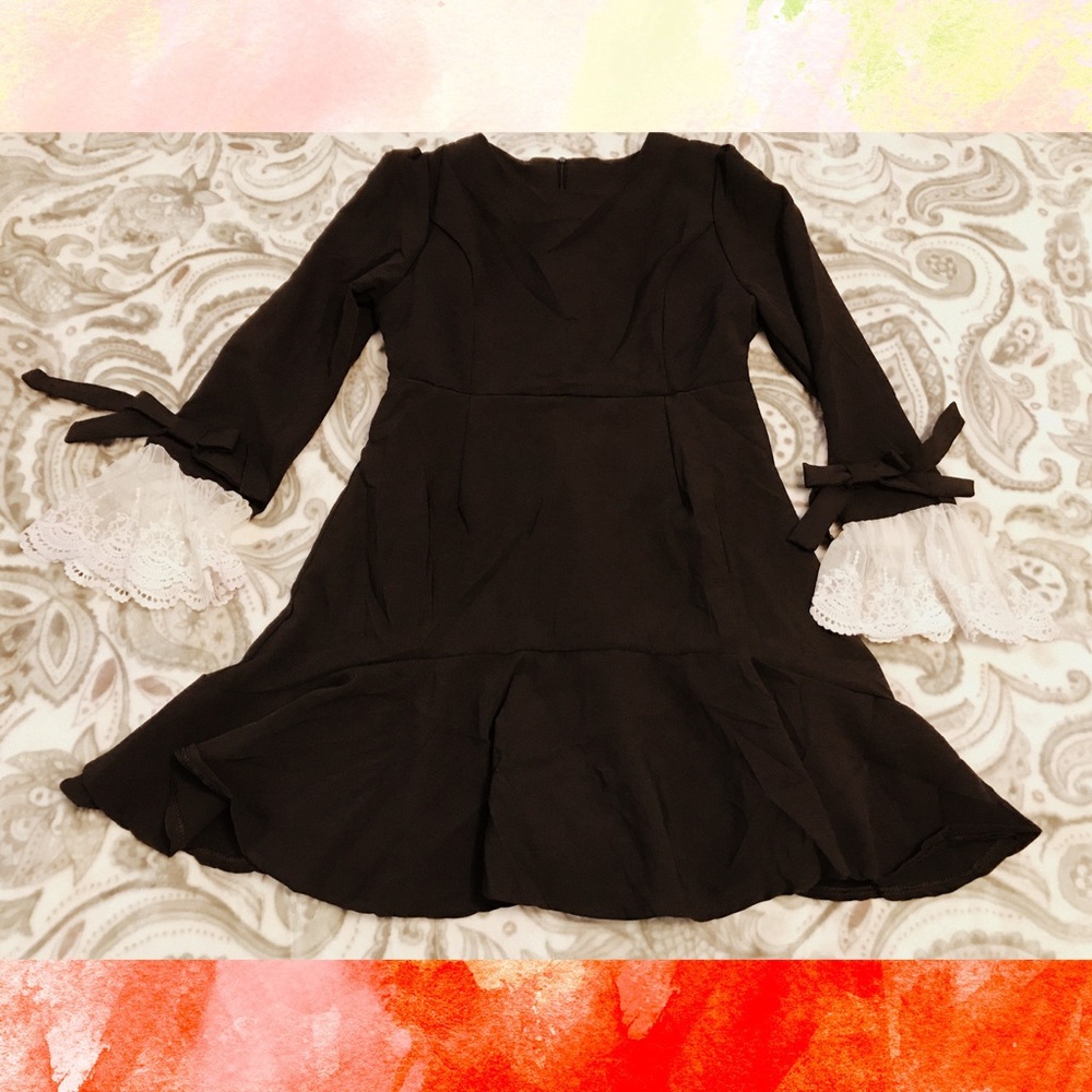 Black Dress with Lace Sleeves and Ruffles