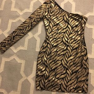 Akira sequin one sleeve dress.