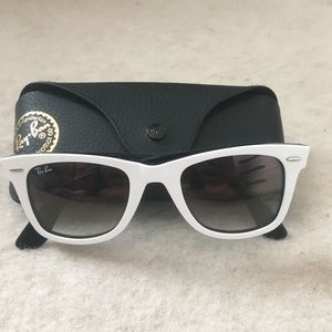 White Rayban Wayfarers.