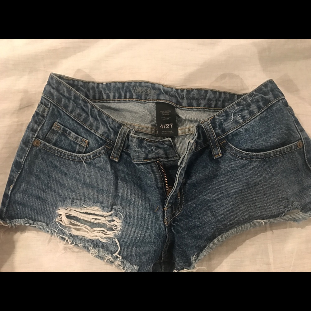 Destroyed denim shorts