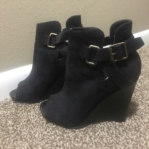 Black wedge booties