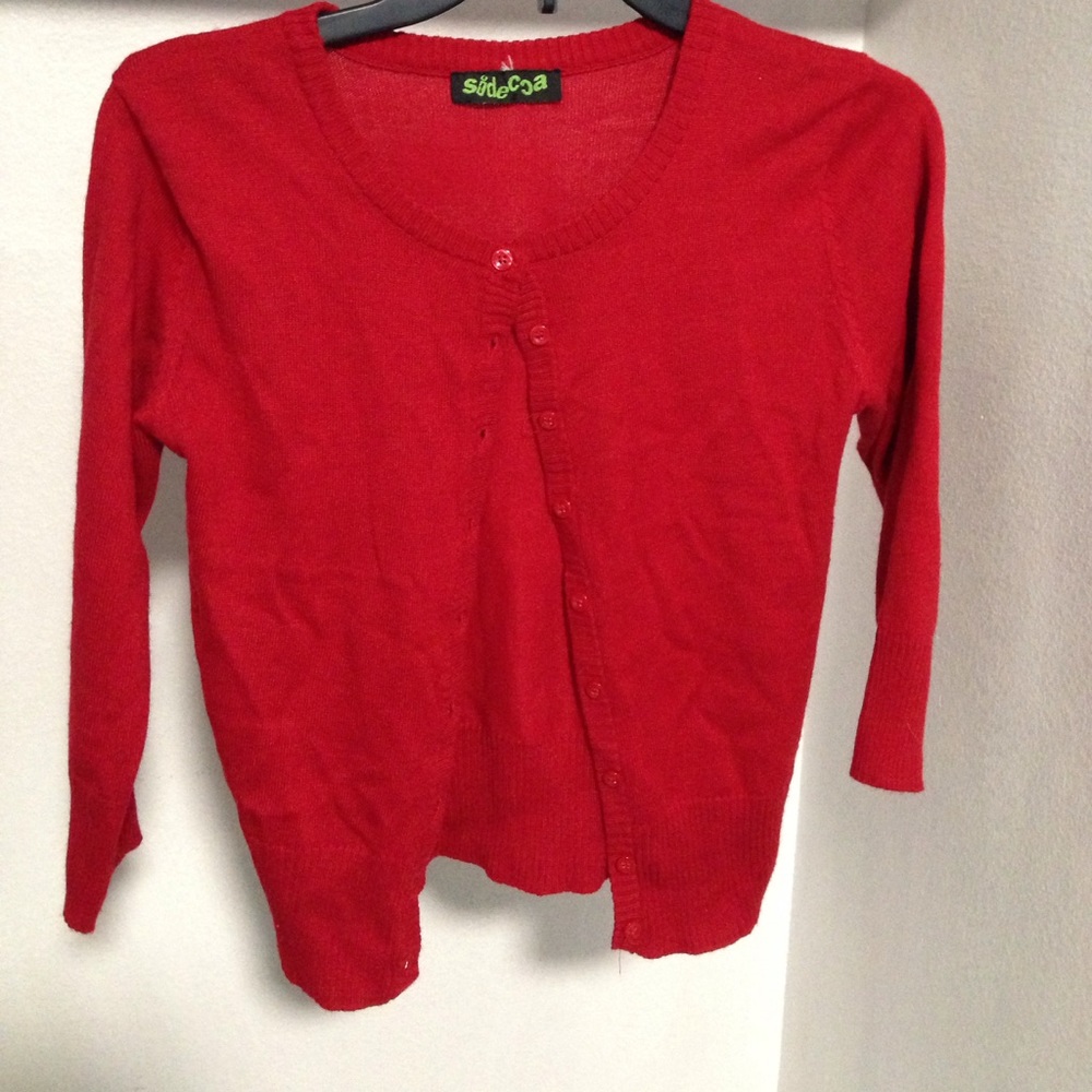 Red cardigan