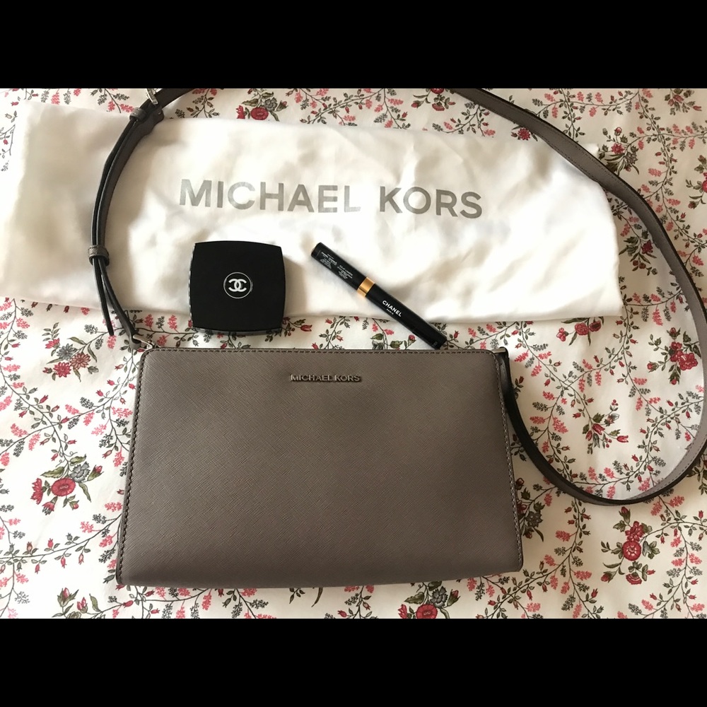 Michael Kors crossbody clutch. Gently Used.