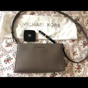 Michael Kors crossbody clutch. Gently Used.