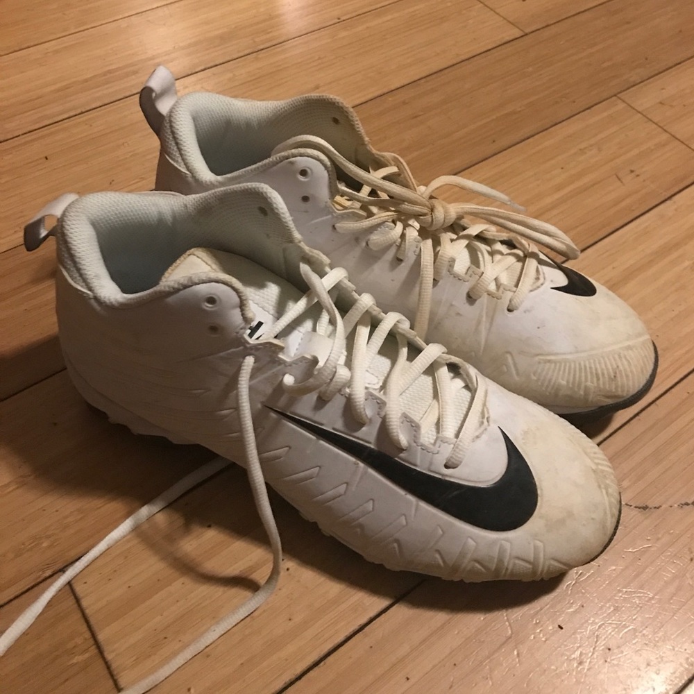 Men Nike baseball cleats. White/black. Never worn!