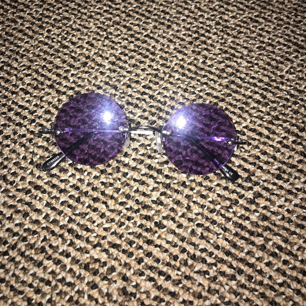 Purple circular sunglasses.
