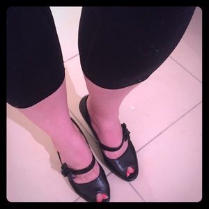 Sofft heels with flower detail.