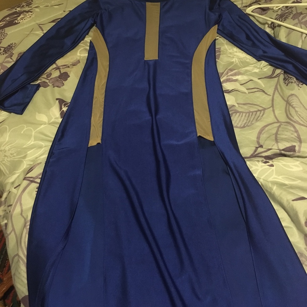 Brand new. Never worn. Splits at bottom