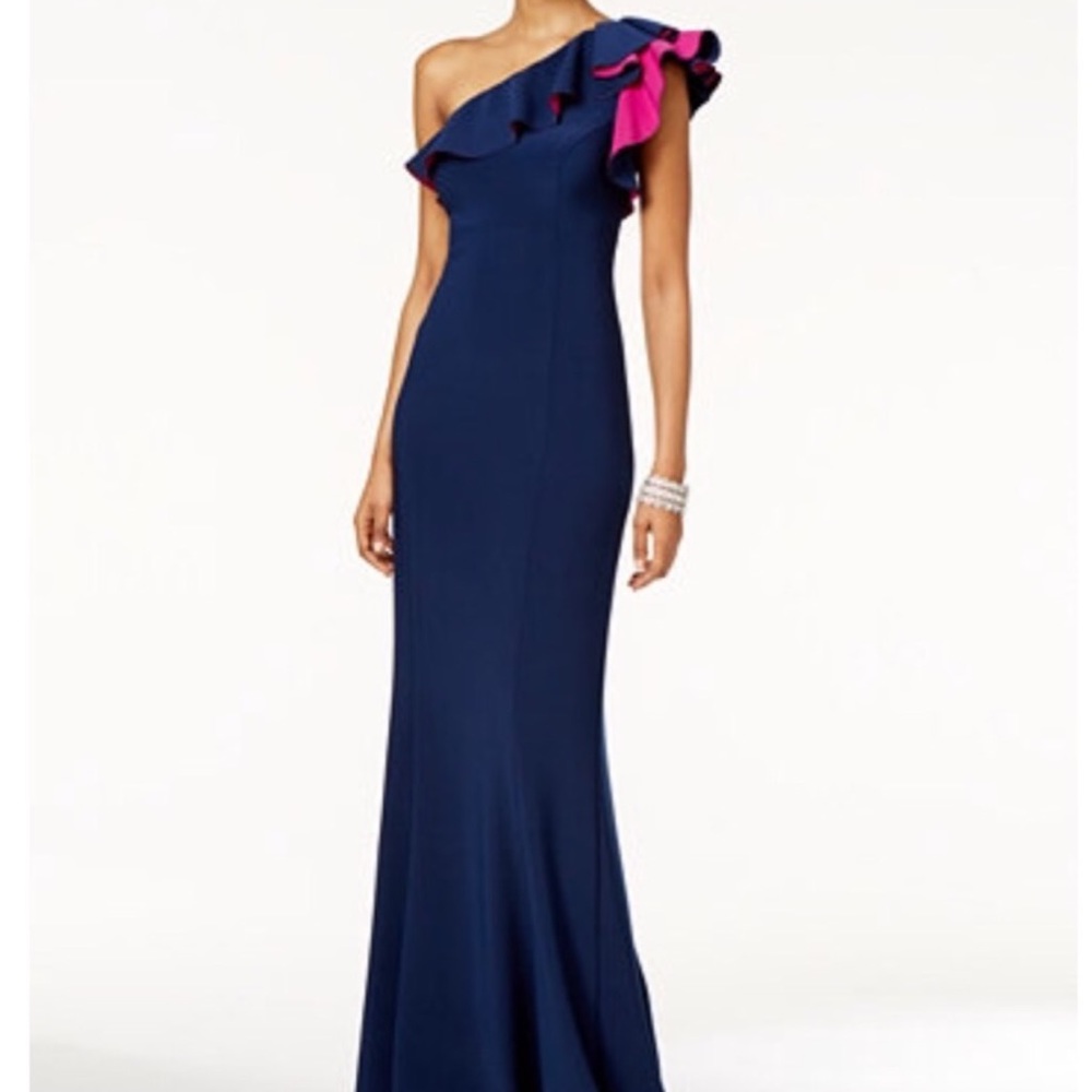 Asymmetrical blue dress w pink ruffle.
