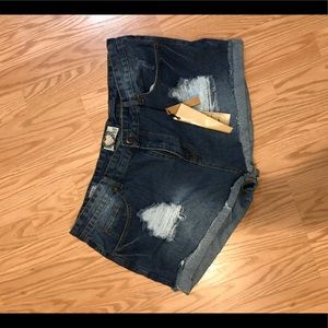 Boohoo distressed jean shorts.