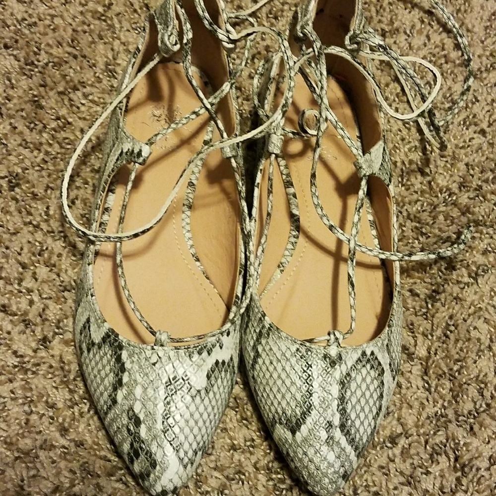 Snake print lace tie flats