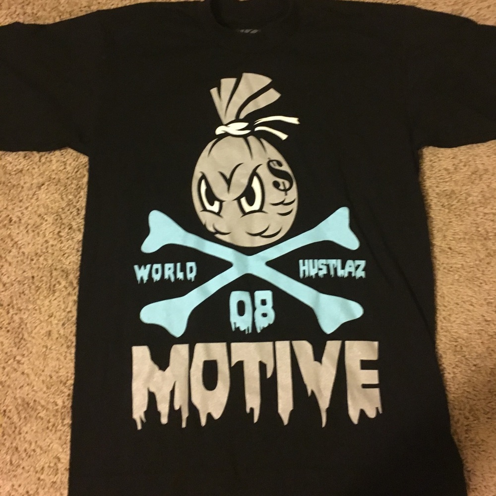 A million dollar motive tshirt in a size medium