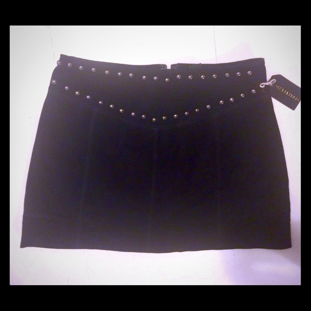 Suede mini skirt with studded detail.