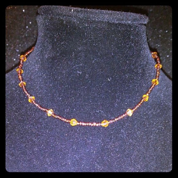 Authentic Swarvoski Amber Crystals on stretch cord - Picture 1 of 2