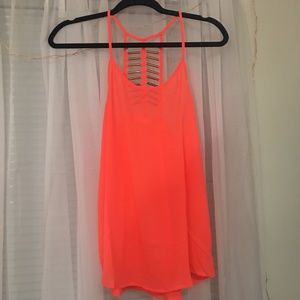 Neon coral tank top. Gold back