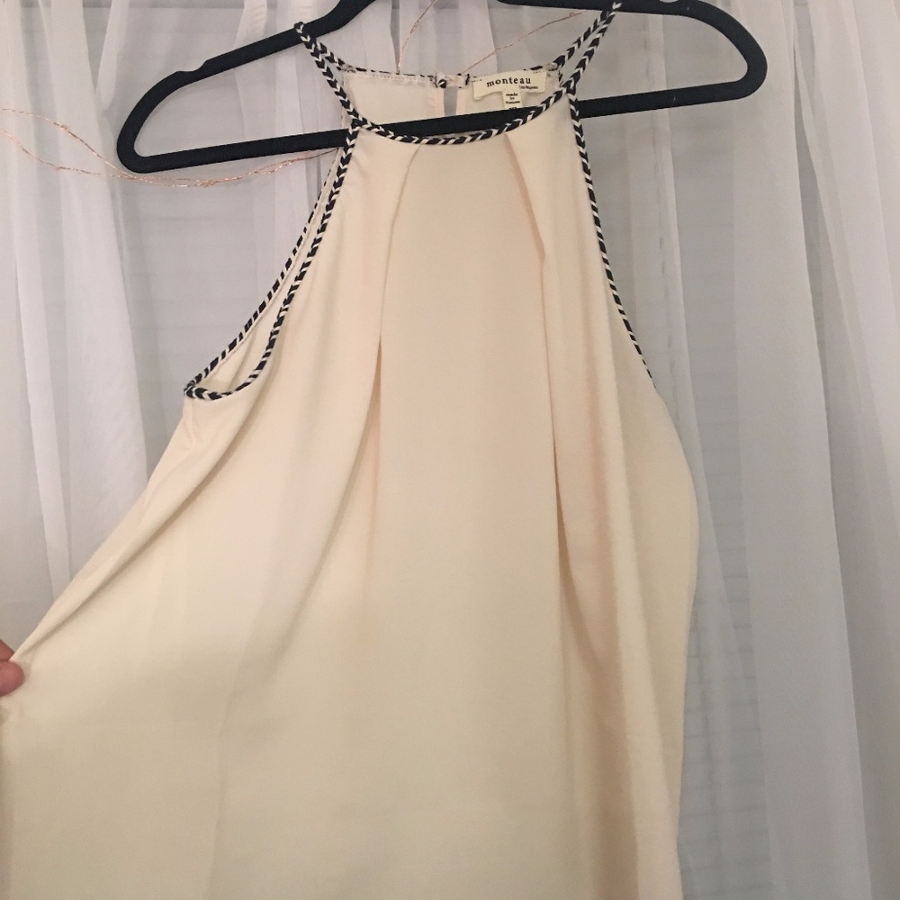 Cute cream colored high neck tank top!