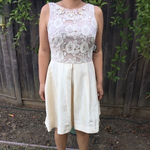 White sleeveless lace and silk dress