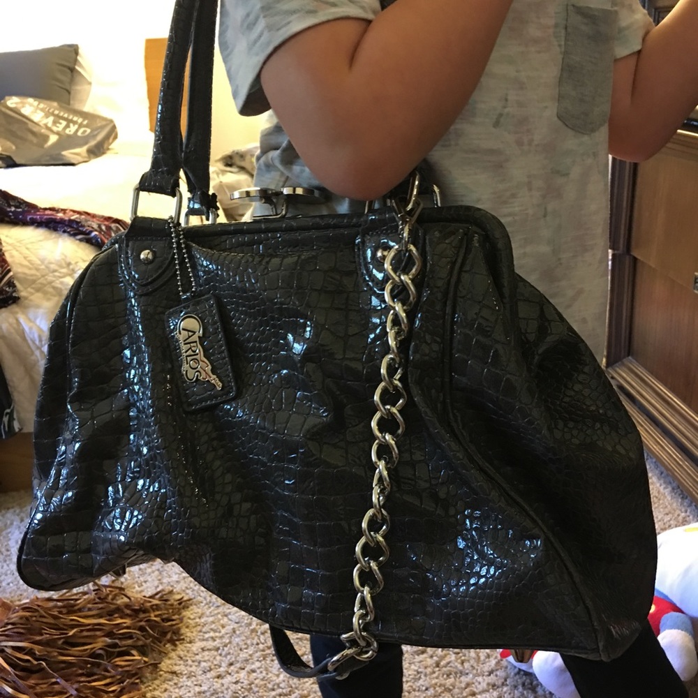 Carlos Santana purse