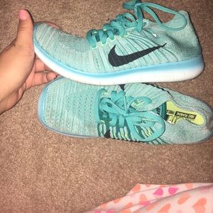 Teal Nike shoes