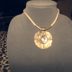 beautiful necklace with precious stone