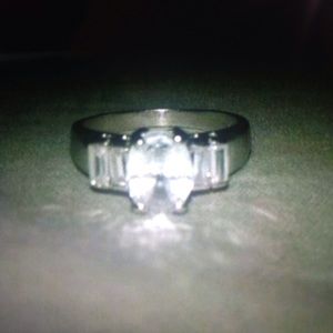 Beautiful silver ring with white topaz stones