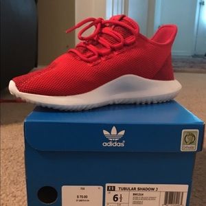 red adidas tubular shadow knit 3 on box