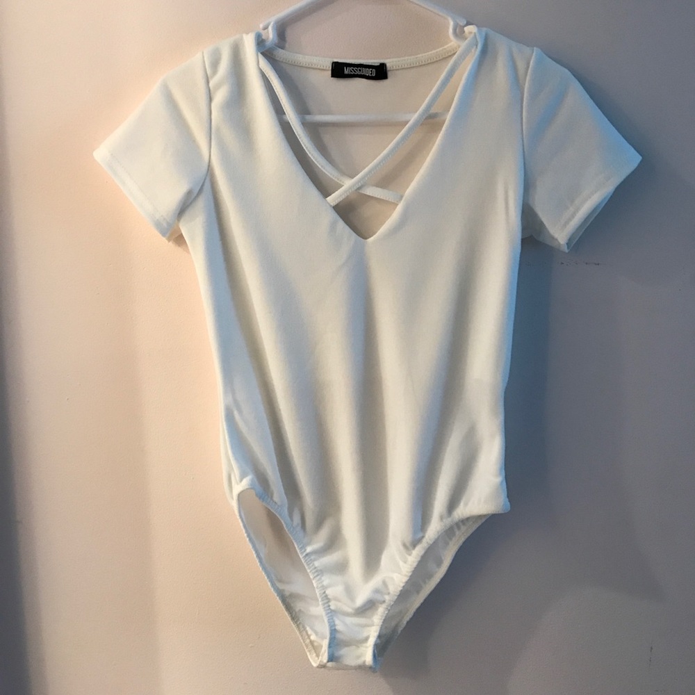 White crisscross bodysuit.
