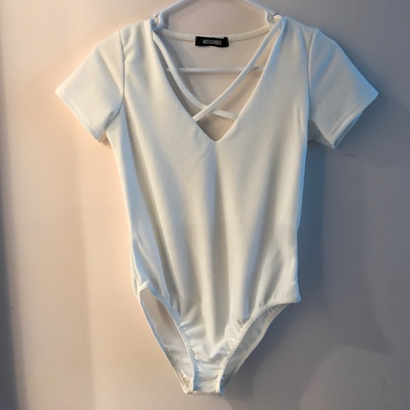 White crisscross bodysuit. - Picture 1 of 3