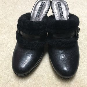 Enzo Angiolini faux leather and fur mules.