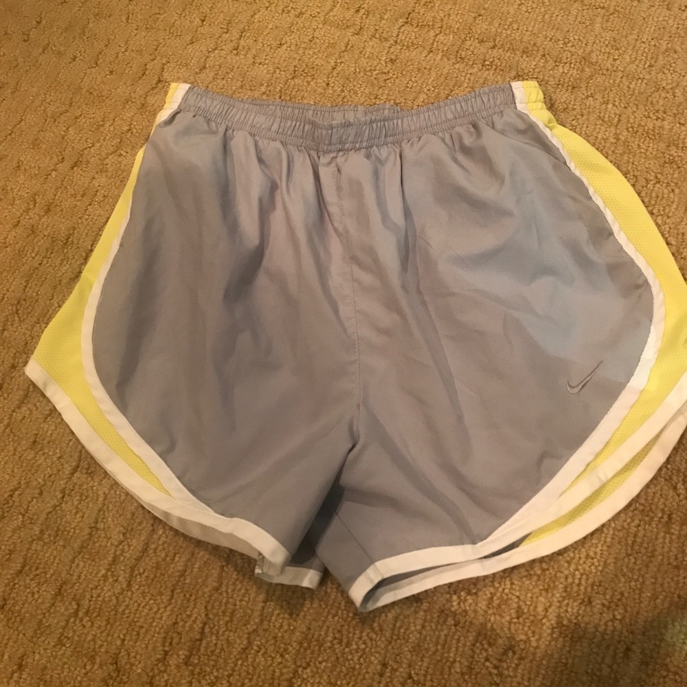 Grey and yellow Nike shorts