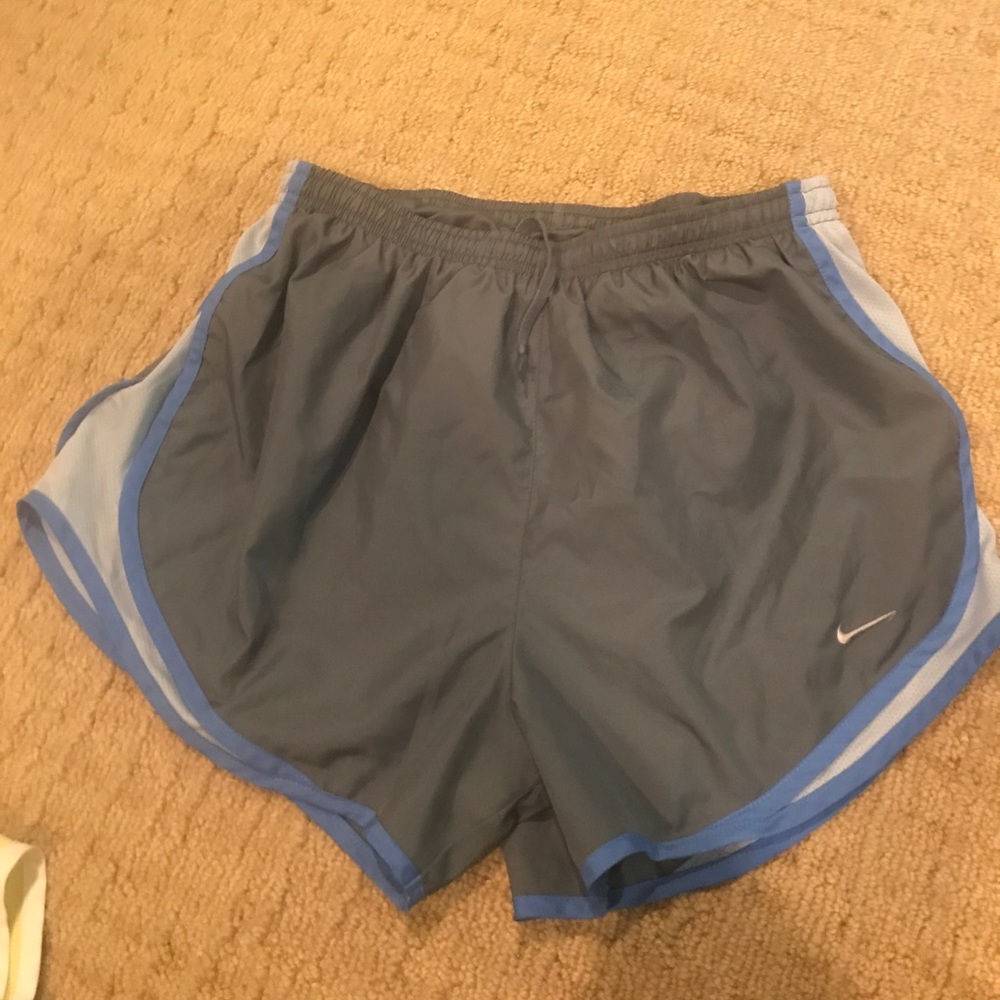 Dark grey and blue nike shorts
