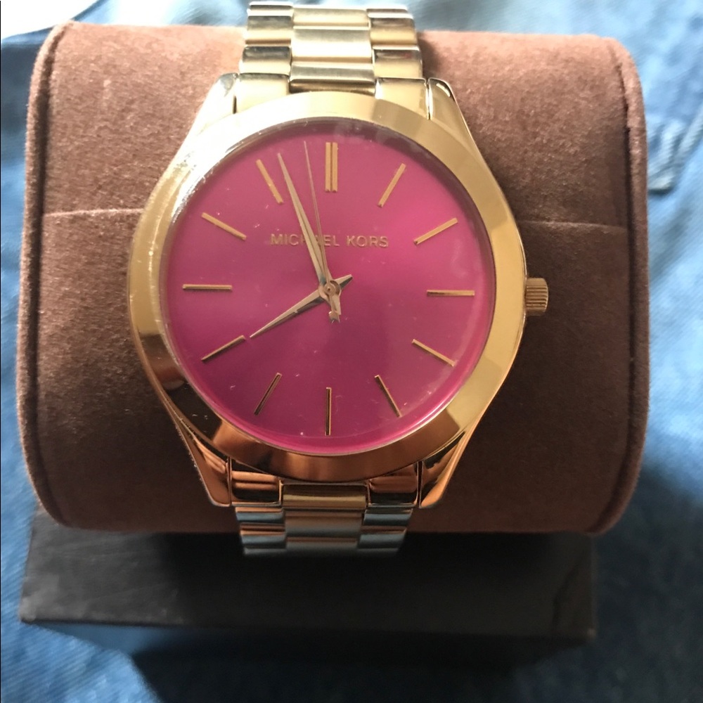 Michael Kors gold watch with pink dial