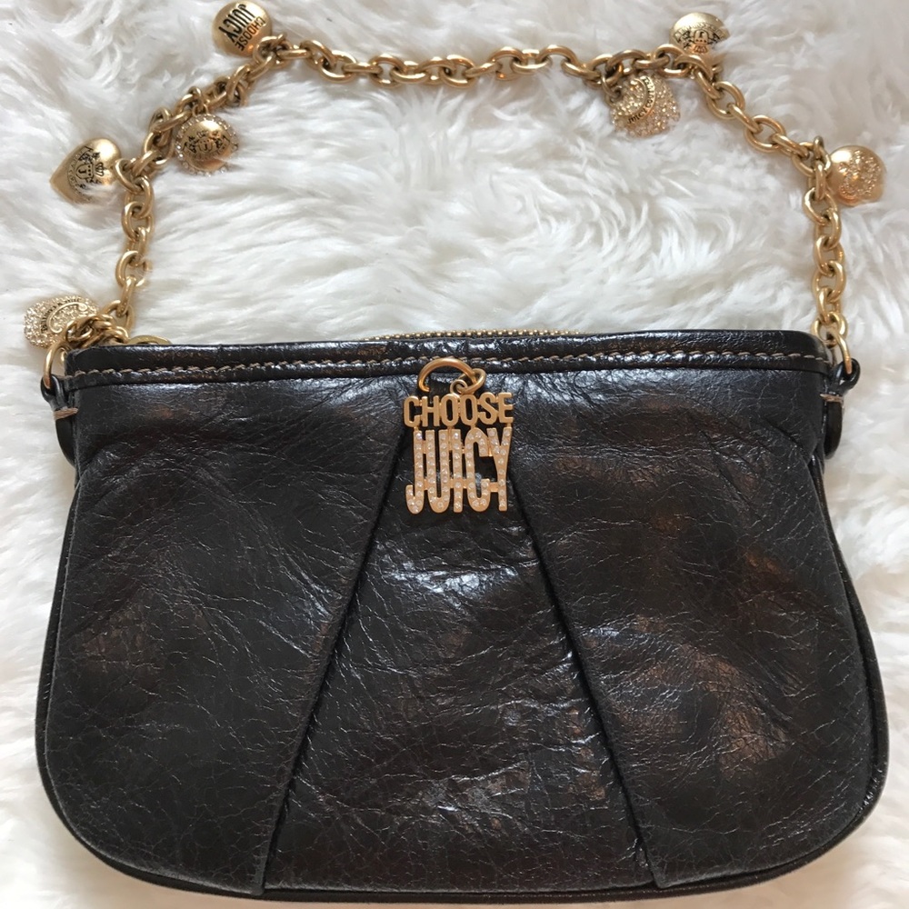 Juicy black leather handbag with gold charm strap