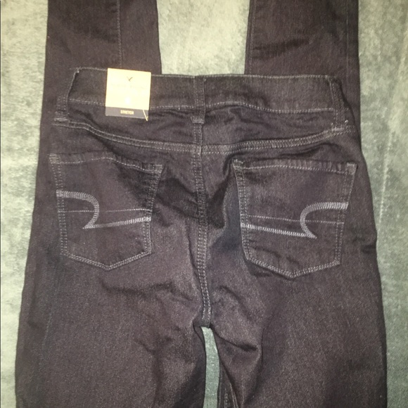 Dark wash stretch jeans size 0 - Picture 2 of 3