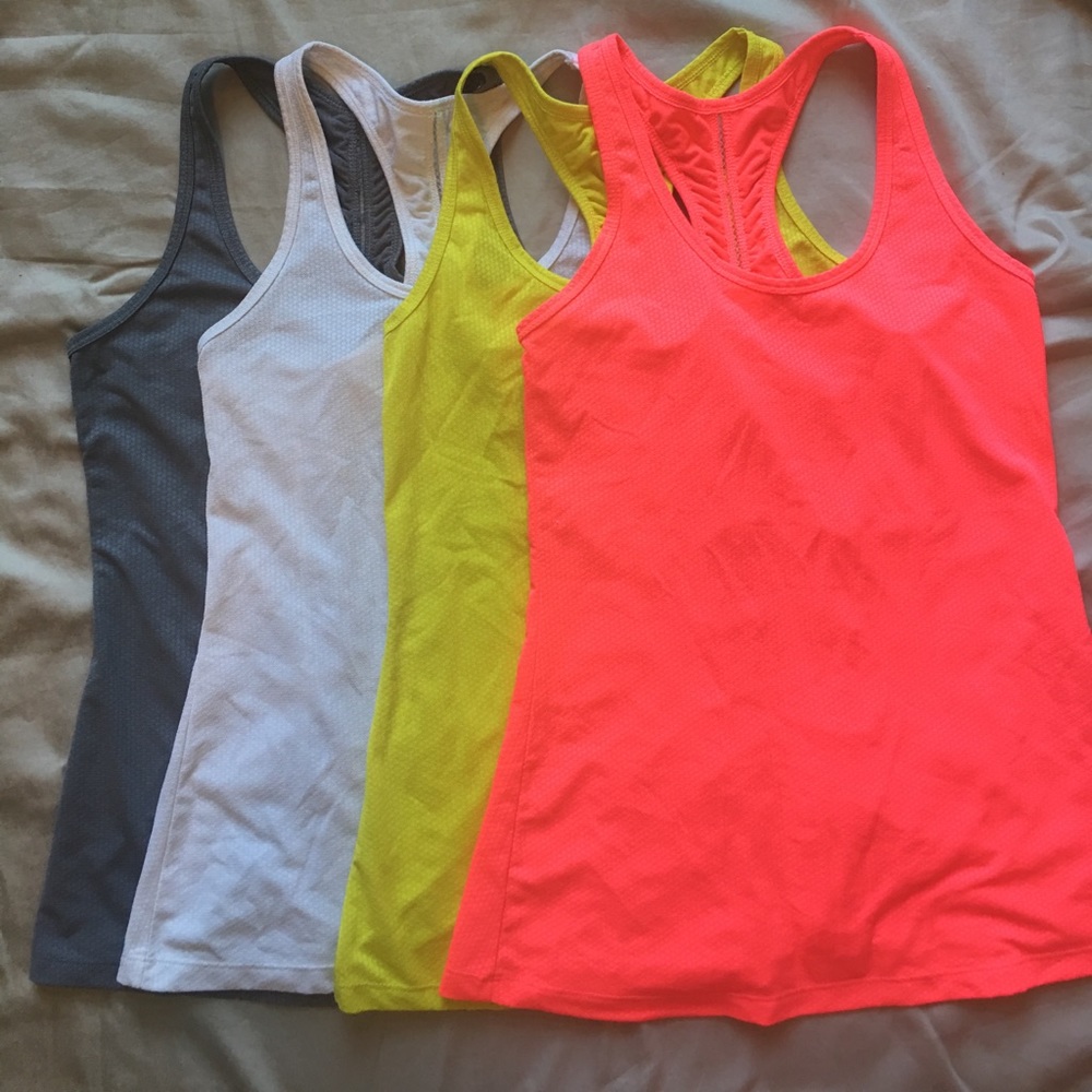 Lots of 4 racerback workout tanks