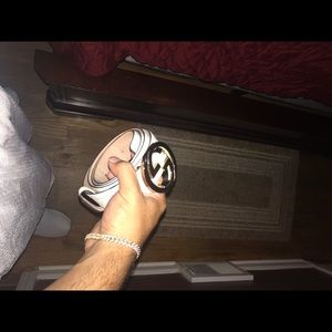White Gucci belt with gold double G buckle