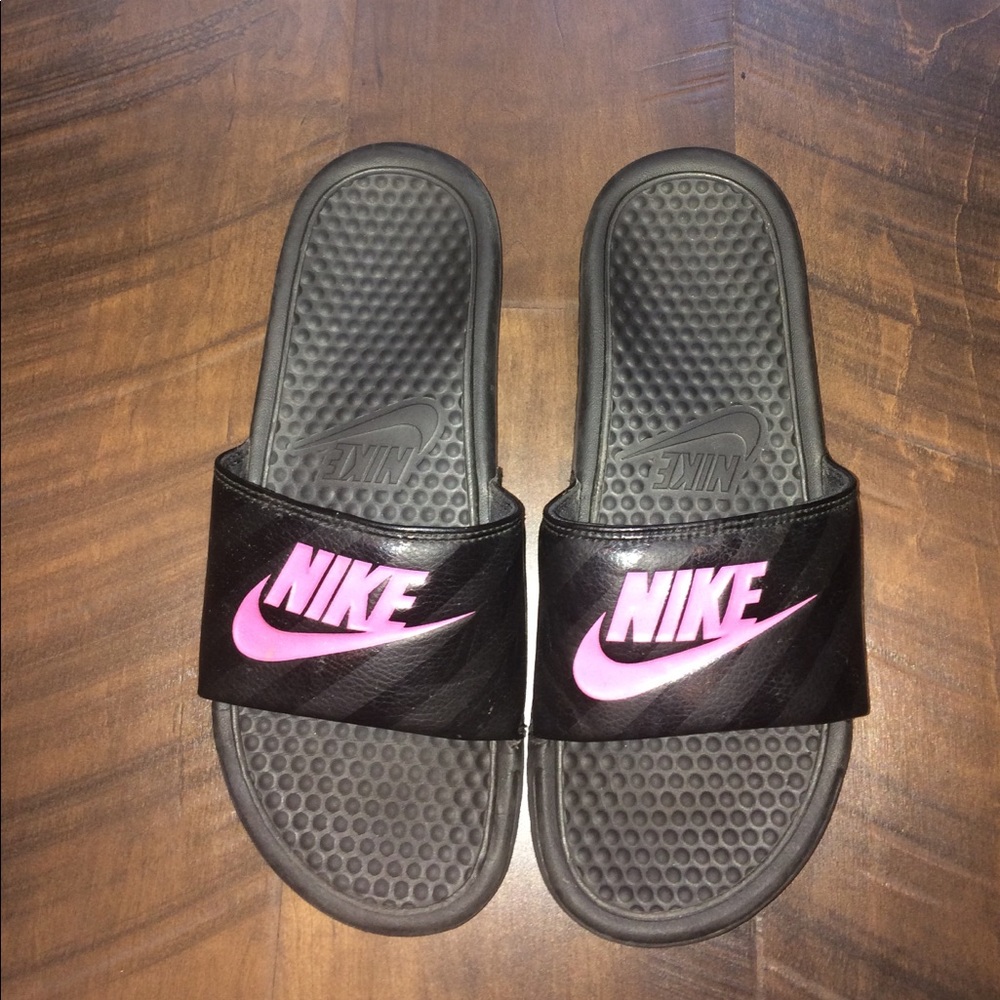 Nike black and pink slides.