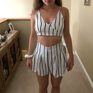 Two piece navy and white pin stripe set