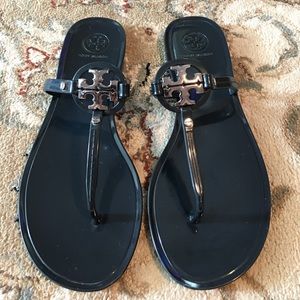 Navy blue Tory Burch sandals.