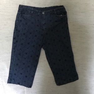 Stretch blue denim capris.