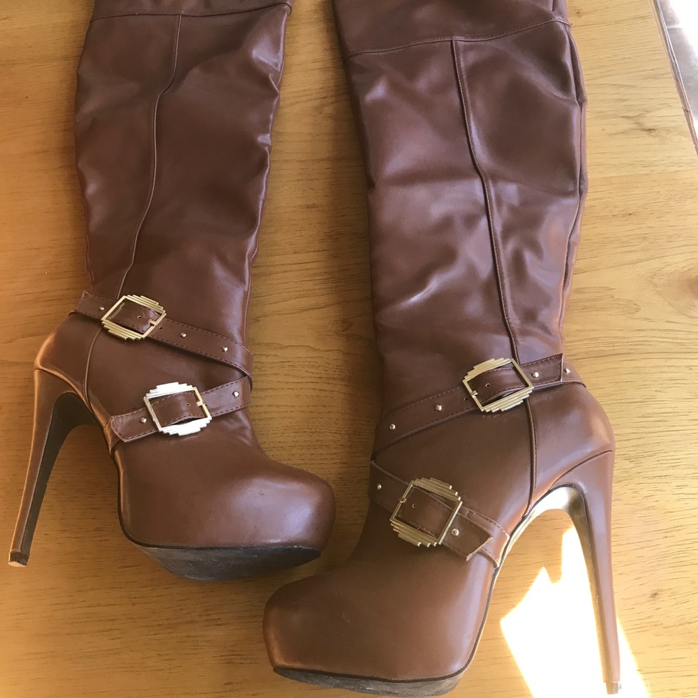 Thigh high, high heeled boots