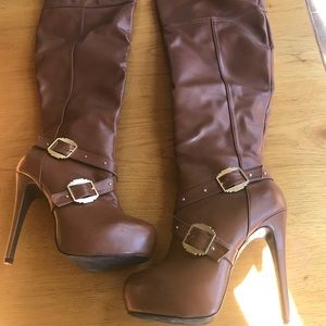 Thigh high, high heeled boots