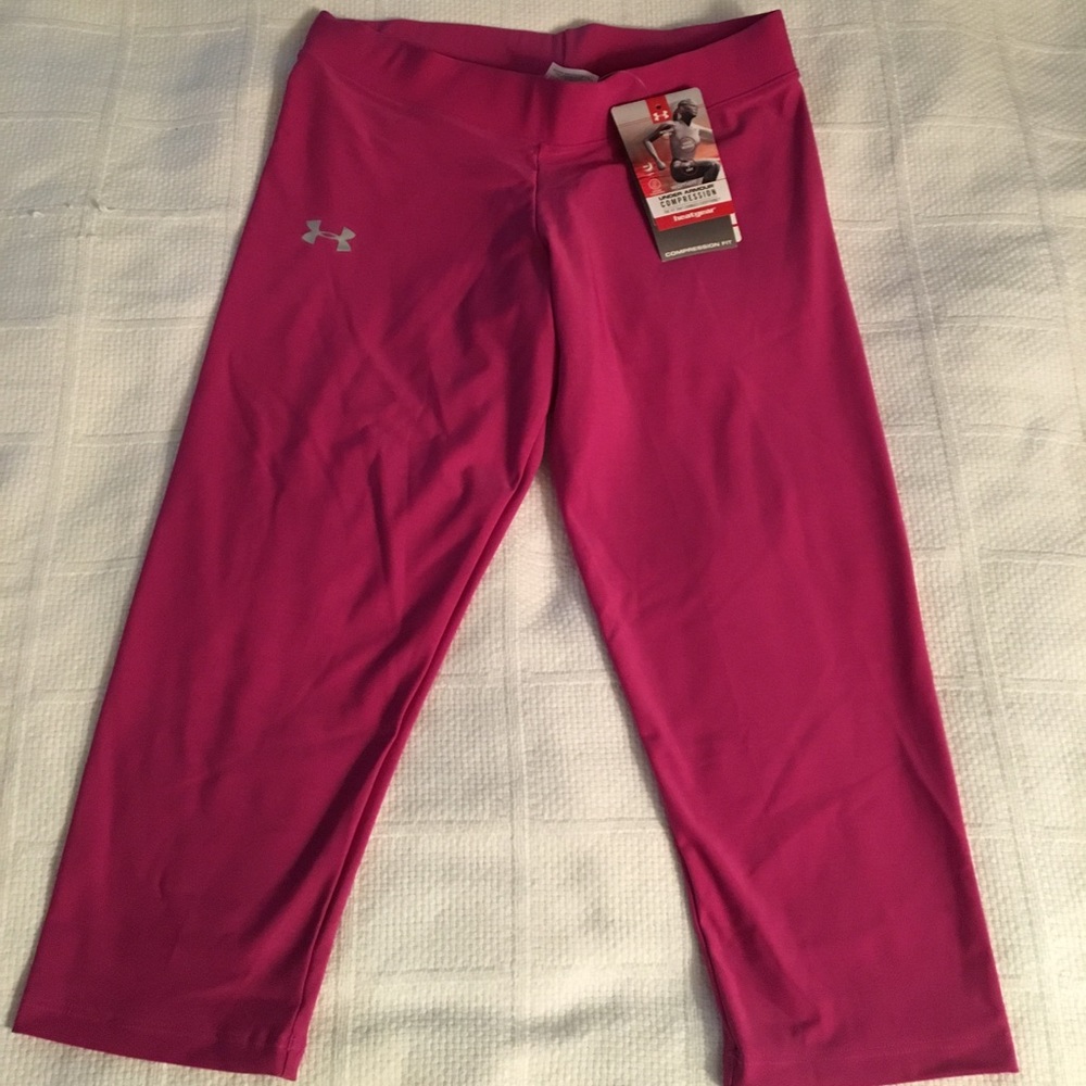 Under Armour pink compression Fit workout pants.