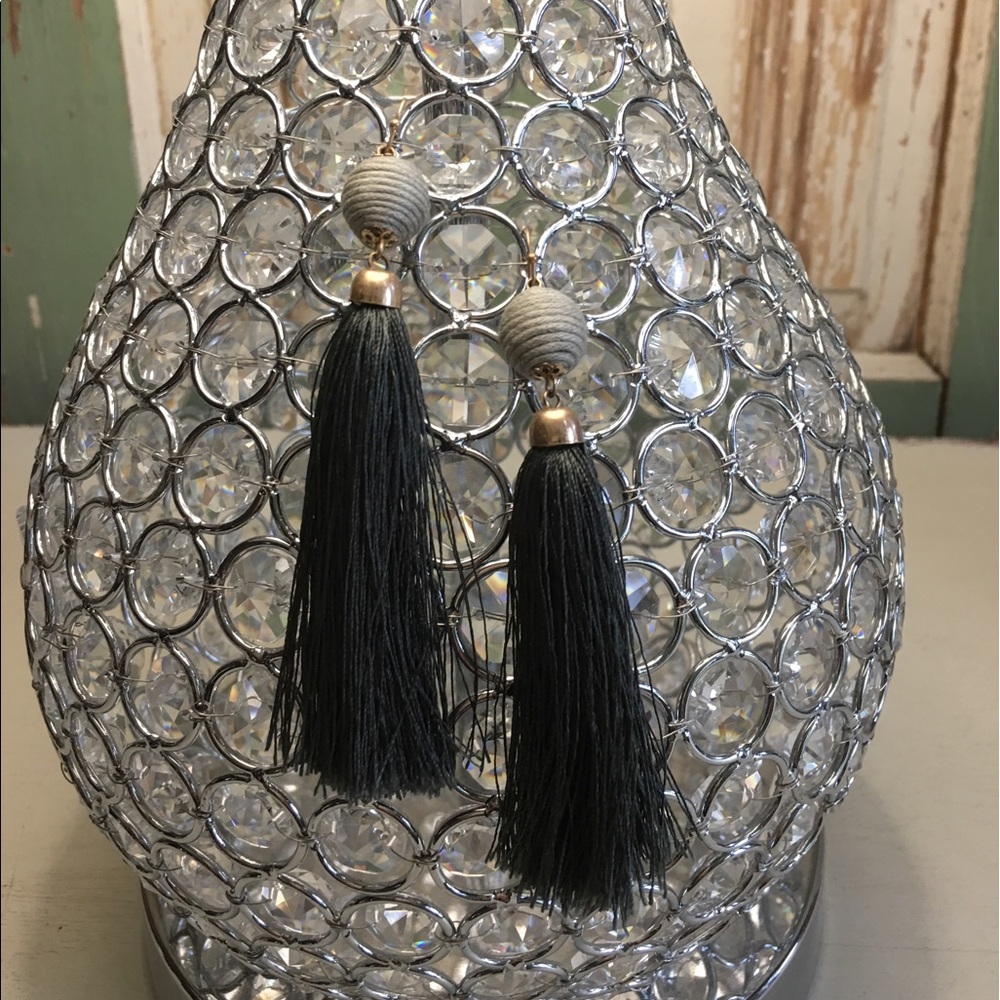 Gold Tone fish hook earrings with Gray Tassels