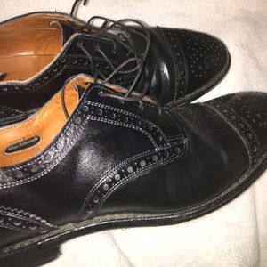 Black Men's Allen Edmonds dress shoes.