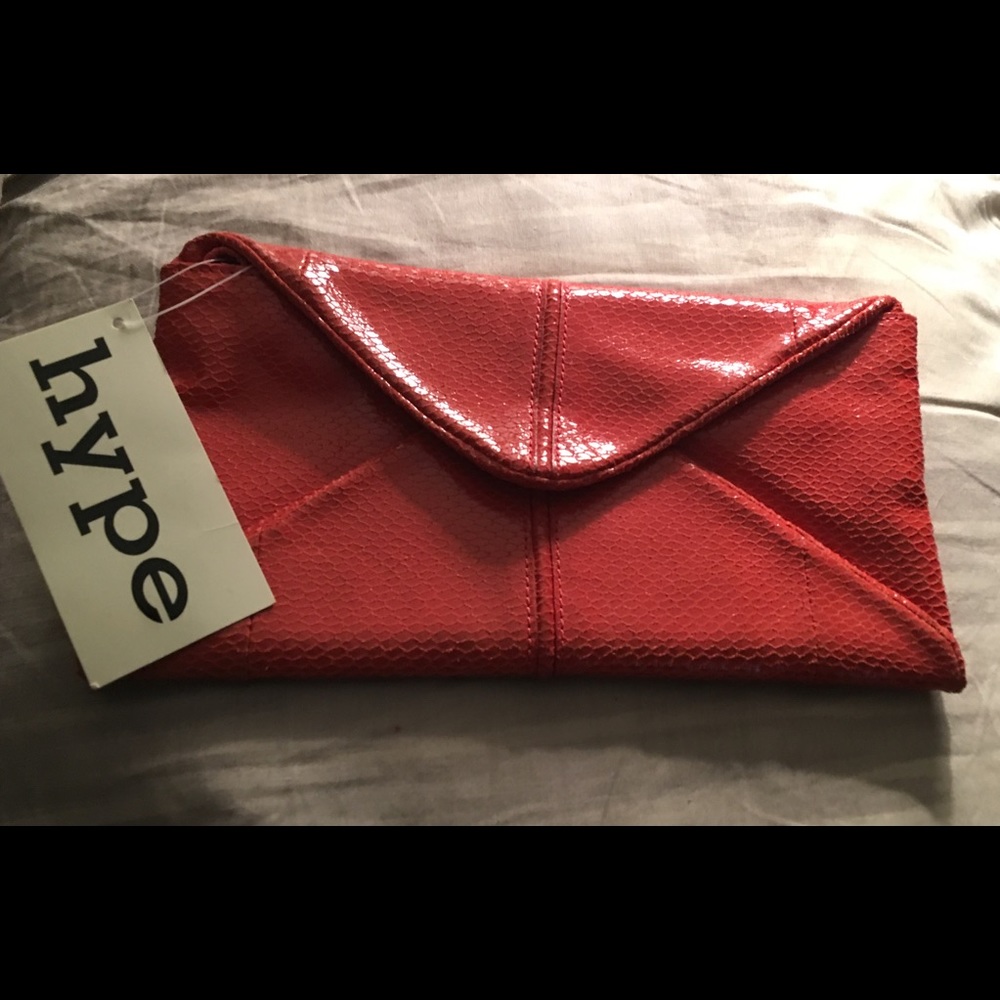 NWT - Hype orange snake skin clutch