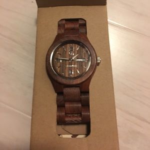 Hand crafted woodman watch