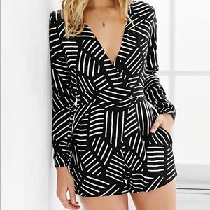 Beautifully fitted Motel Romper with pockets