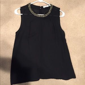Black shear blouse with button up back
